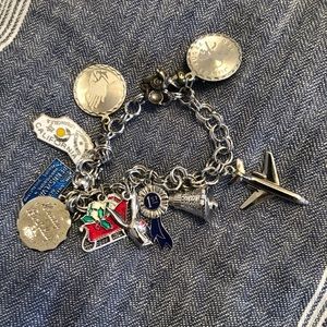 Charm bracelet and charms